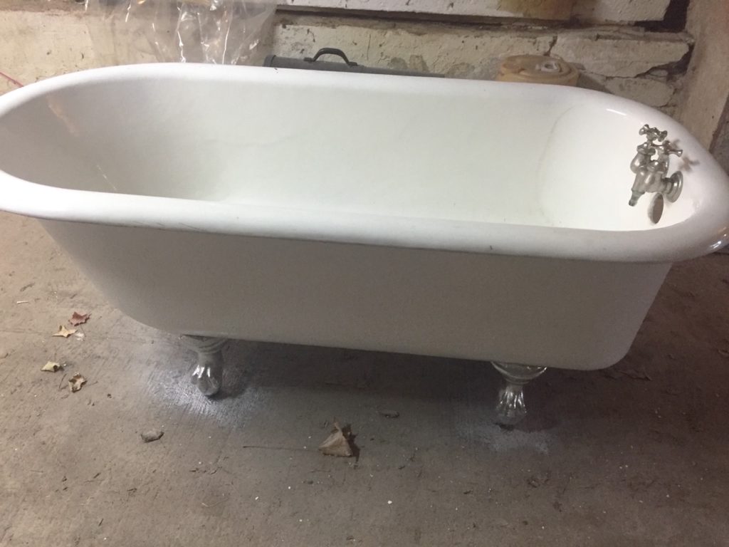 farmhouse freshly painted clawfoot tub